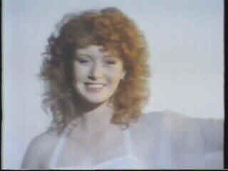 The lady smiles! (image from videoclip)